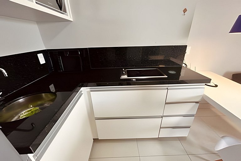 Flat no melhor de Santos. Pé na areia com piscina!
