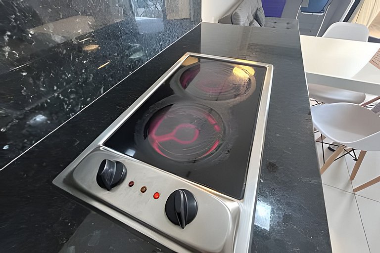 Flat no melhor de Santos. Pé na areia com piscina!