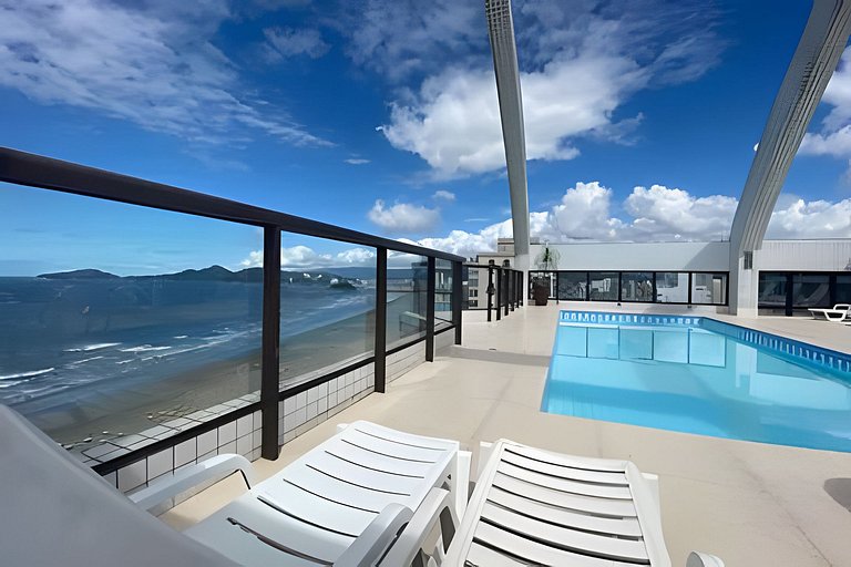 Flat no melhor de Santos. Pé na areia com piscina!