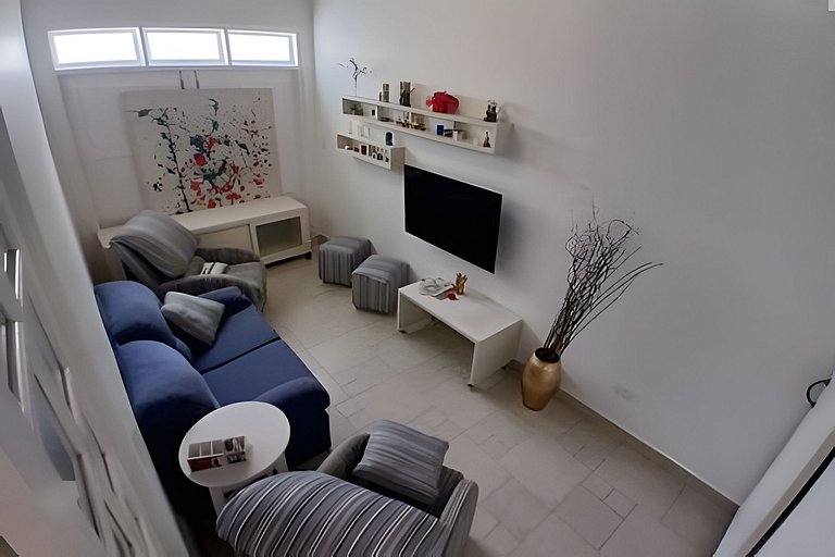 Casa quadra da praia com ar-condicionado e 2 vagas