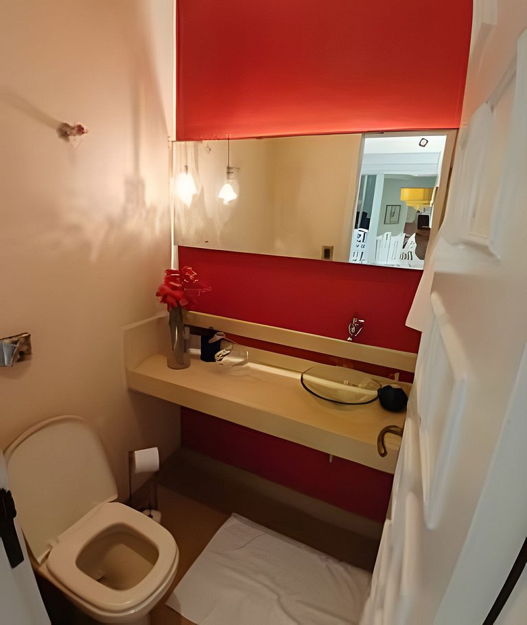 Casa quadra da praia com ar-condicionado e 2 vagas