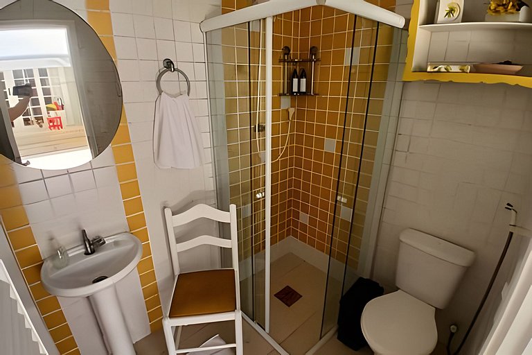 Casa quadra da praia com ar-condicionado e 2 vagas
