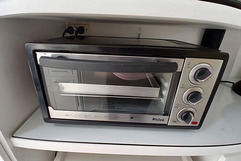 Casa quadra da praia com ar-condicionado e 2 vagas